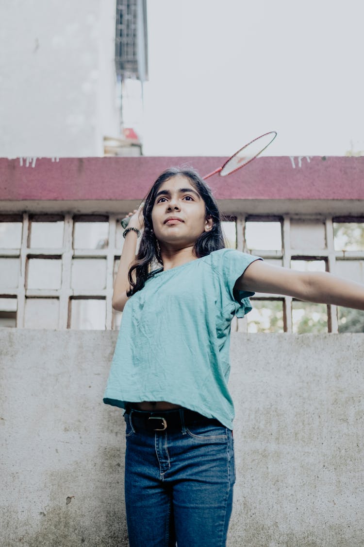 Girl Playing Badminton 