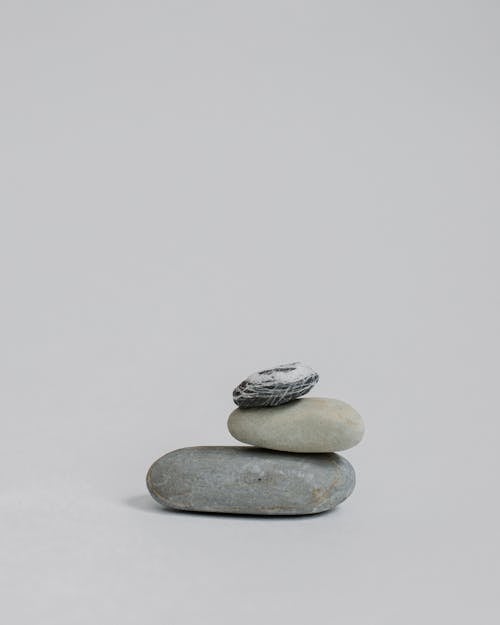 Three Stones Stack on top of Each Other from the Largest to Smallest 