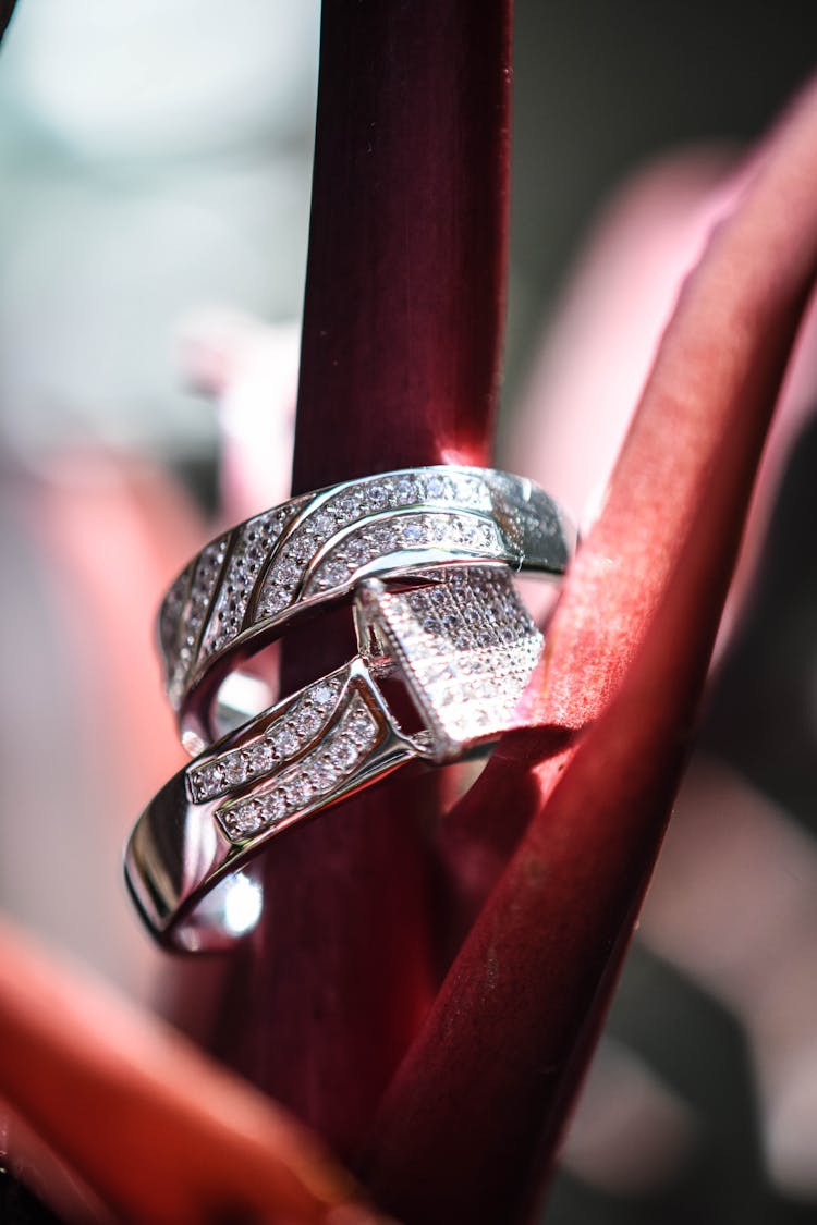 Macro Photography Of Two Diamond Rings