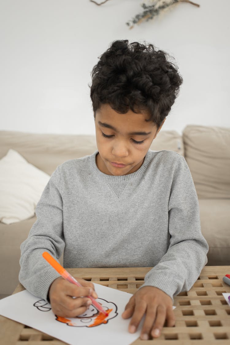 Focused Black Boy Coloring Paper