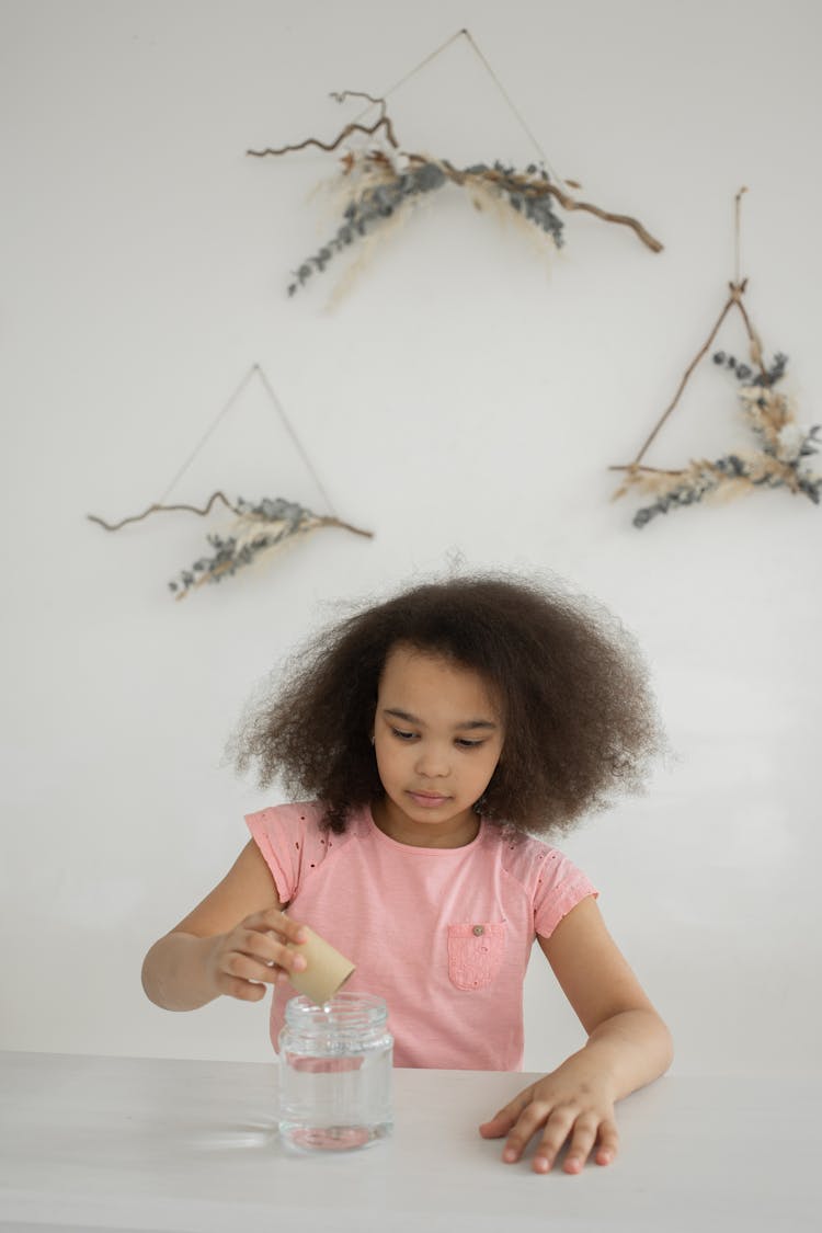 Cute Girl With Glass Jar With Water