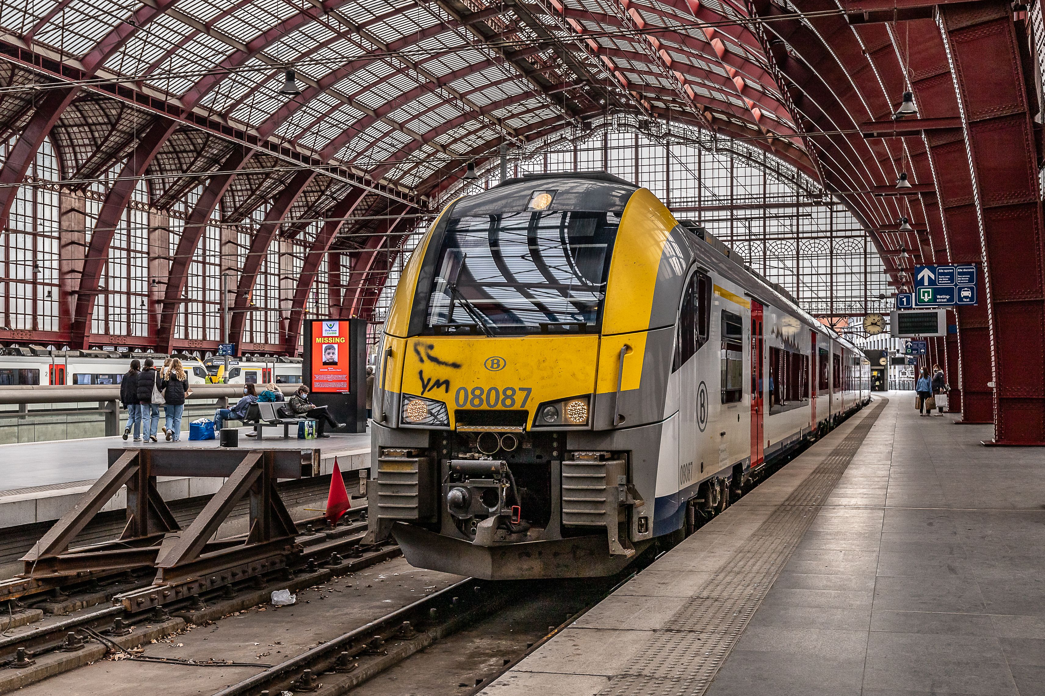 SNCB/NMBS train arriving at a station platform in Belgium