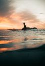 Man in Water during Sunset