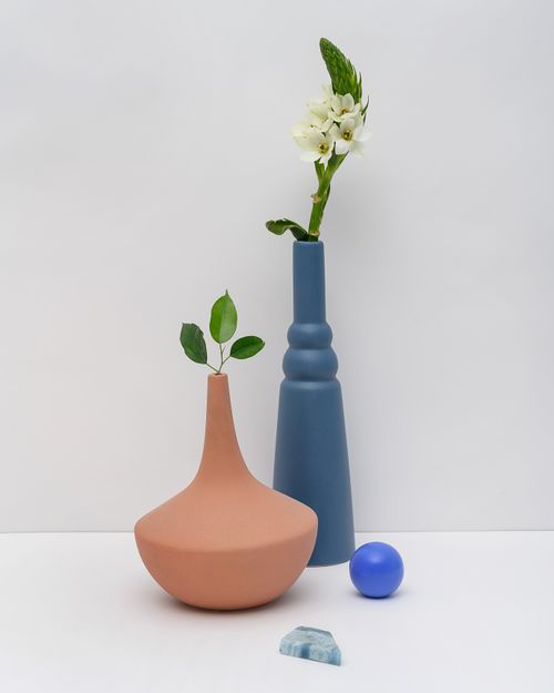 Free Minimalist arrangement featuring vases with greenery and a modern aesthetic. Perfect for decor inspiration. Stock Photo