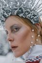 Woman in White Floral Head Dress