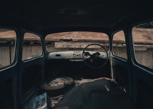 Dark Symmetrical Photo of a Car Wreck