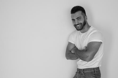 Free Black and White Photo of a Man Wearing White Shirt Stock Photo