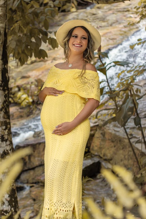Pregnant Woman in Yellow Dress