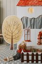 Brown Bear Plush Toy on White and Blue Floral Table Cloth