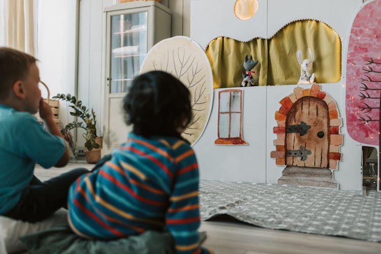 Toddlers Watching A Puppet Show 