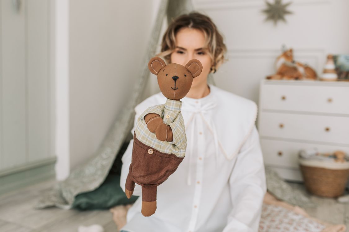 Woman holding a Puppet · Free Stock Photo