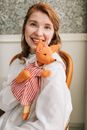 Woman Wearing a Hand Puppet