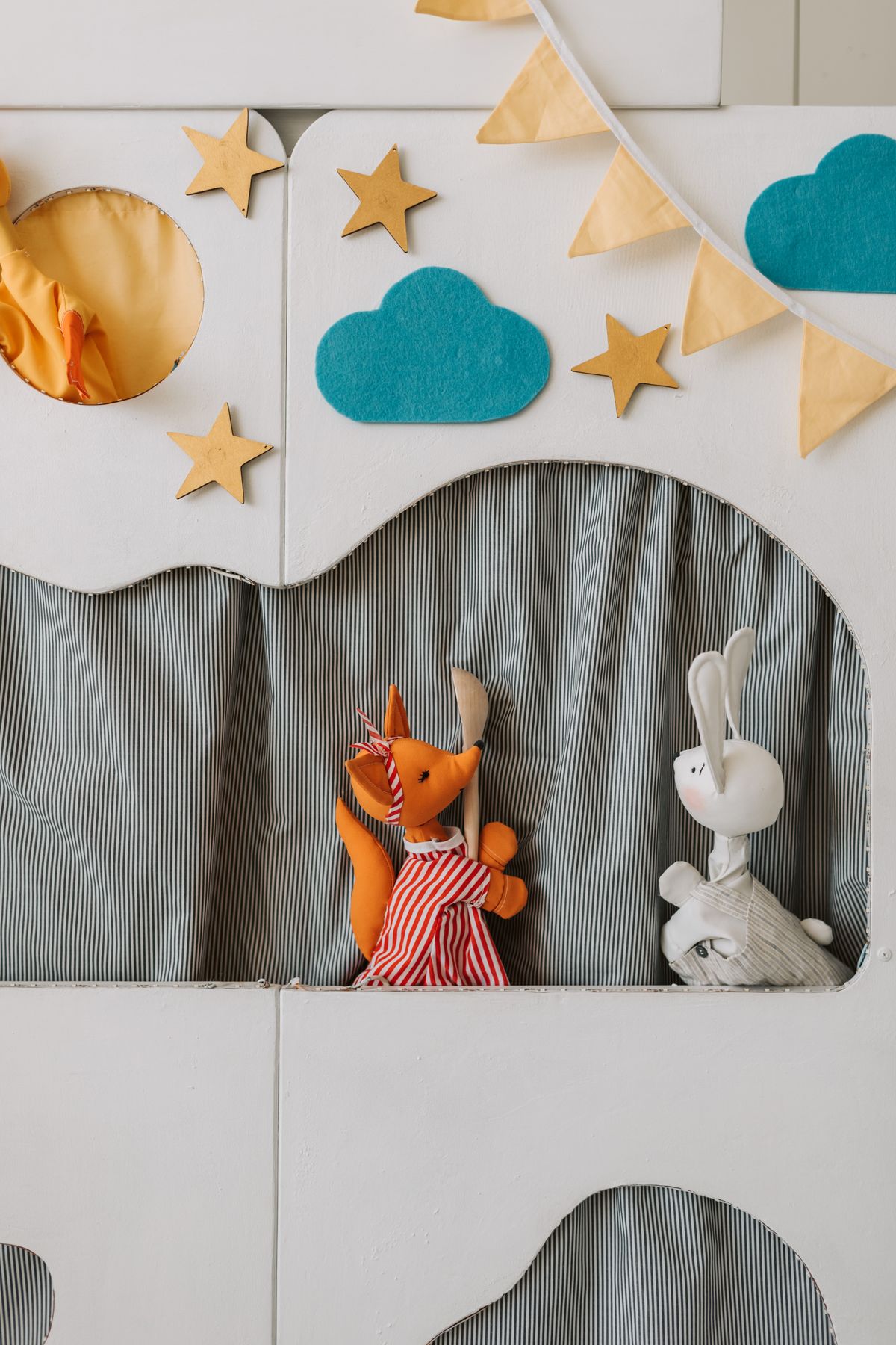 Close-up of a puppet show stage with animal puppets