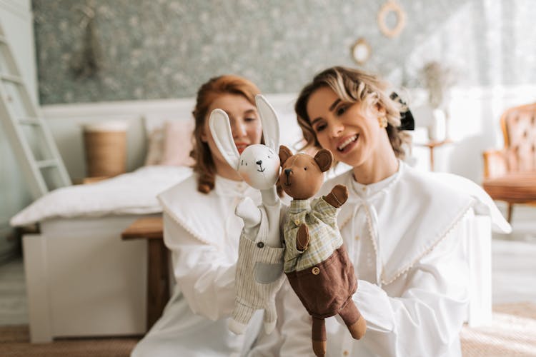 Two Women Playing Puppets