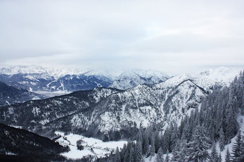 Free Scenic View of Mountains Covered with Snow Stock Photo