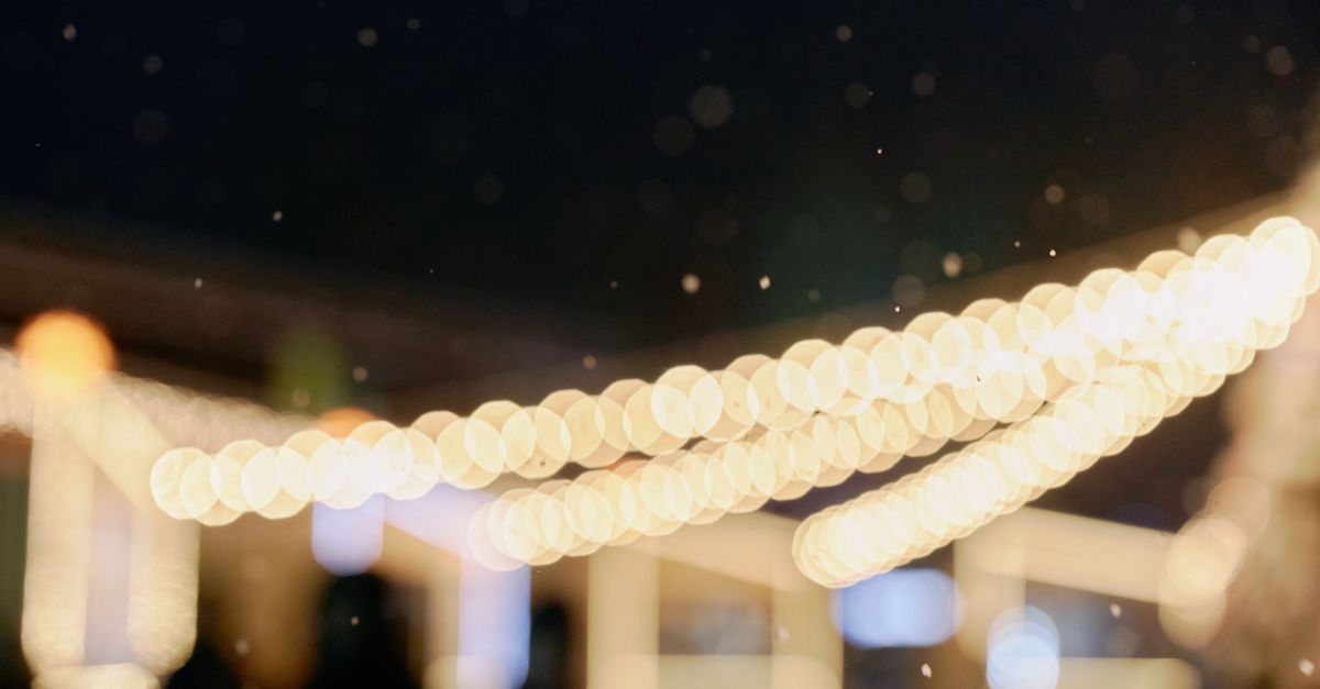 Ethereal bokeh effect of warm, twinkling lights at night, creating a dreamy atmosphere.