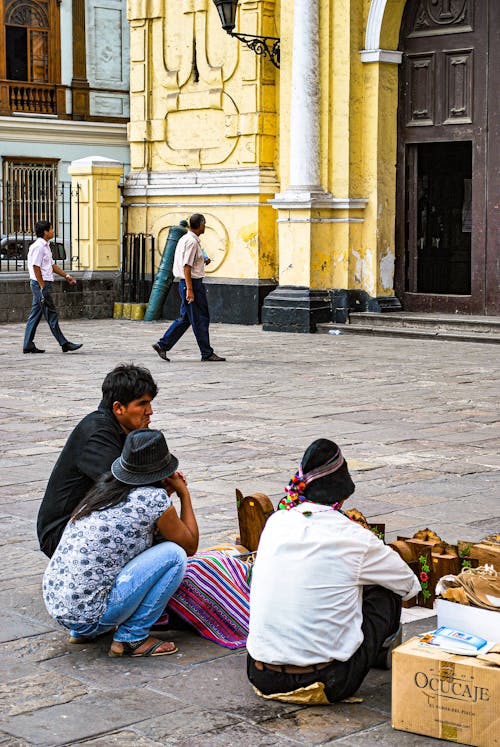 Merchants Sitting on the Concrete Floor
