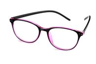 Red Framed Eyeglasses on White Surface