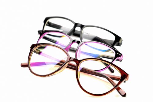 Free A set of three stylish eyeglasses in different colors and styles, displayed on a white background. Stock Photo