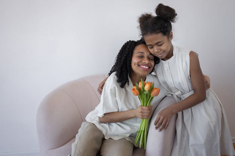 Daughter Giving Her Mother A Present