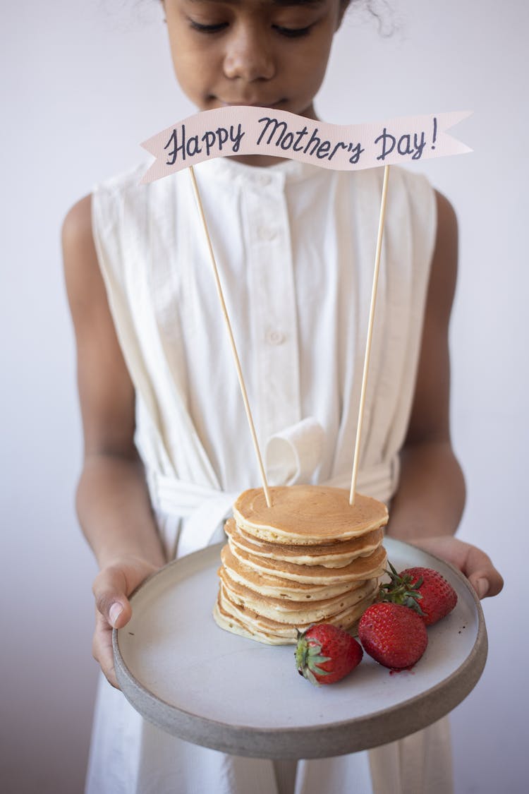 Girl Holding Food With Wishes For Mothers Day