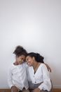 2 Women in White Button Up Shirt