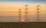 Silhouette of Electric Towers During Sunset