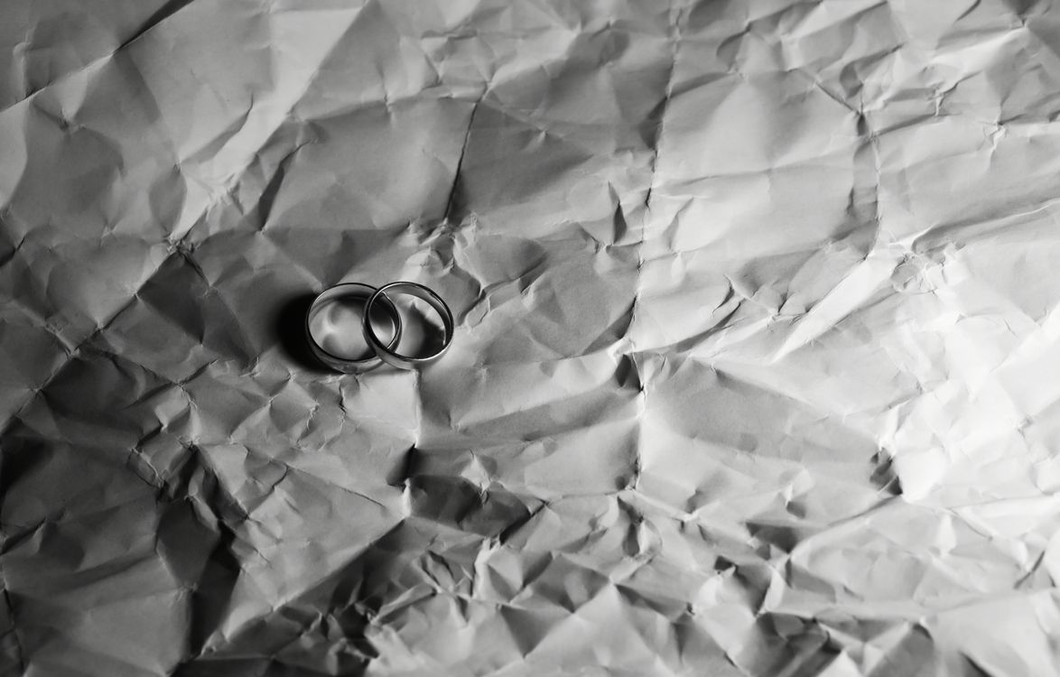 Paper Rings Background Rings on Crumpled Paper · Free Stock Photo