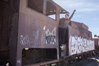 Brown Wooden Train With Graffiti