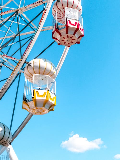 White Ferris Wheel Under the Blue Sky