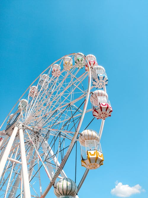 White Ferris Wheel Under Blue Sky