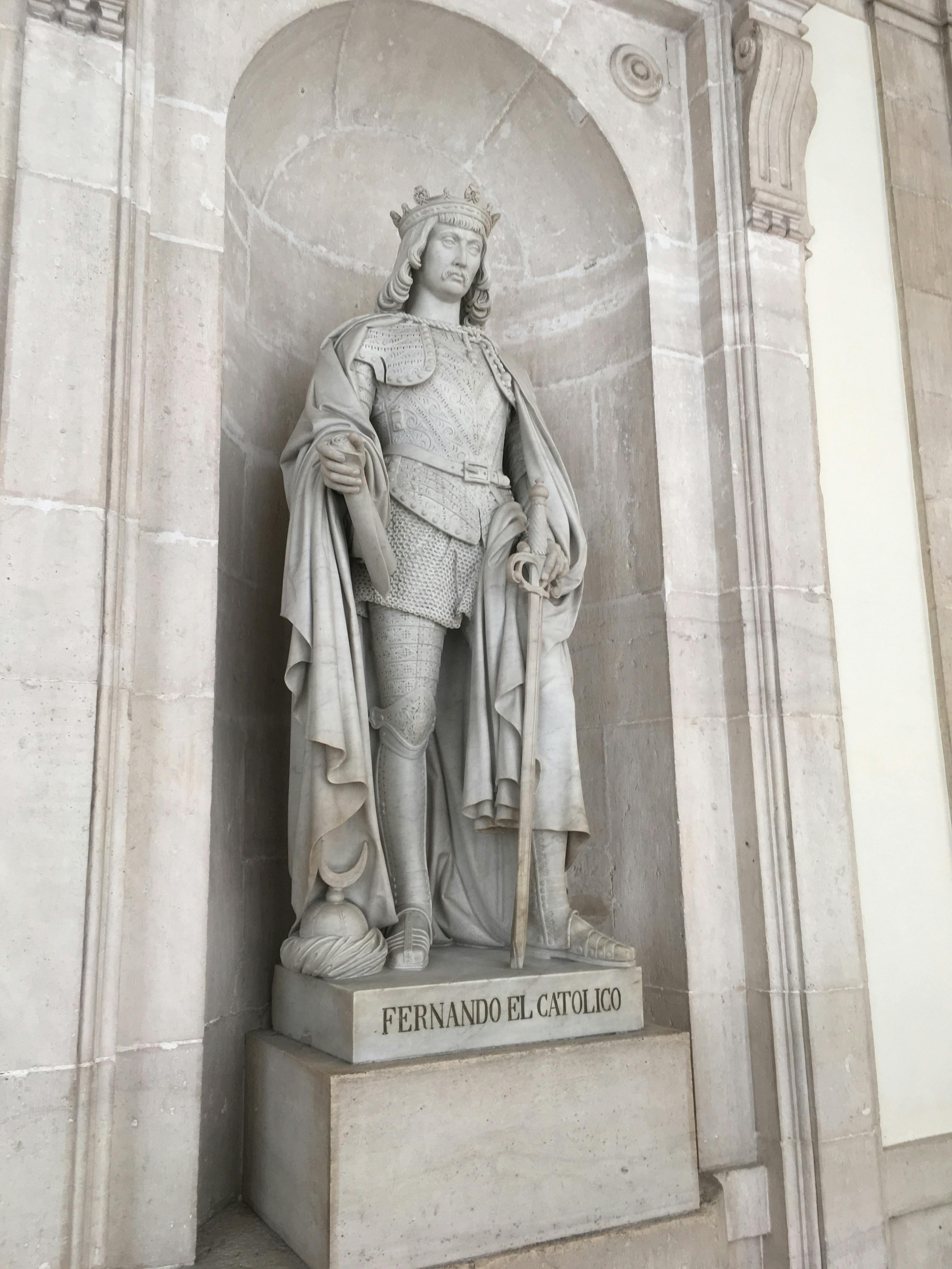 the statue of ferdinand the catholic in the royal palace of madrid