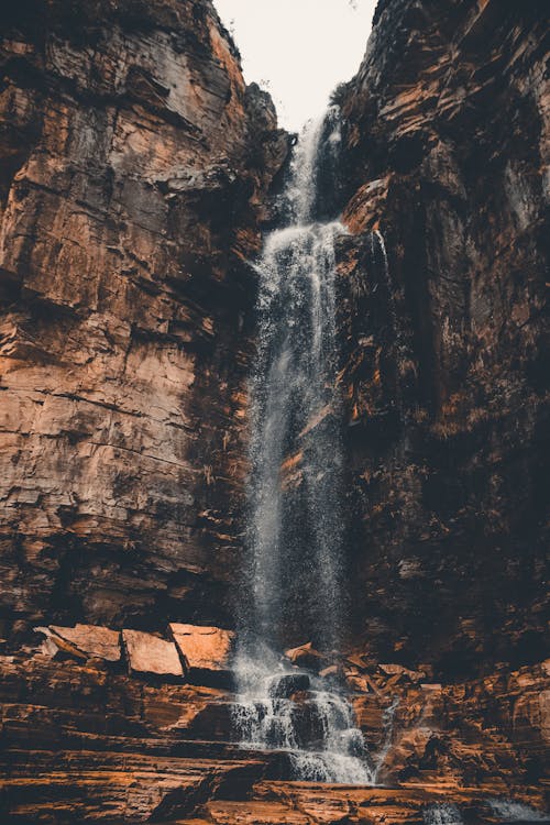Free A Waterfall on a Rocky Mountain Stock Photo