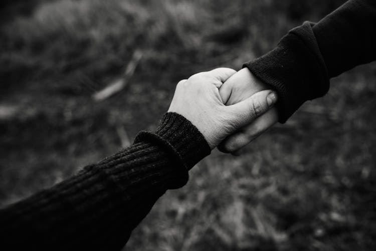 Black And White Photo Of Holding Hands