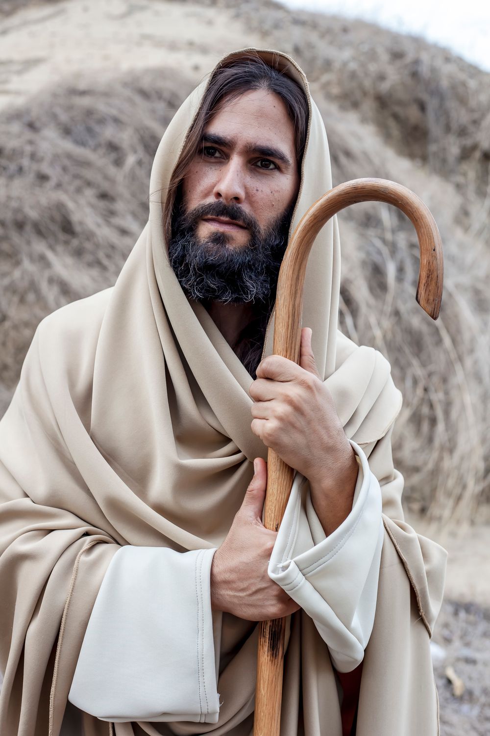 Shepherd In Robe A Man in Brown Robe Holding a Shepherd's Crook · Free Stock Photo