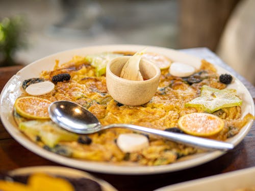 
Cooked Dish on White Ceramic Plate