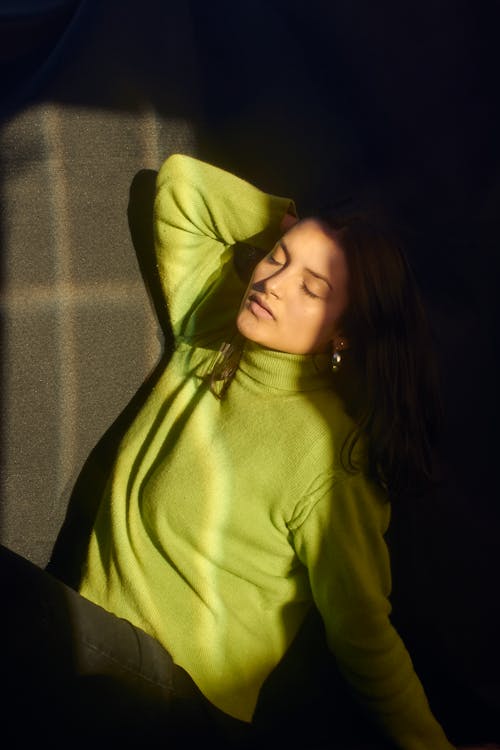 Free Woman in Green Turtleneck Sweater Posing Stock Photo