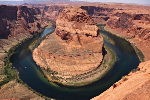 Free Stunning aerial shot of the iconic Horseshoe Bend in Arizona, showcasing the meandering Colorado River. Stock Photo