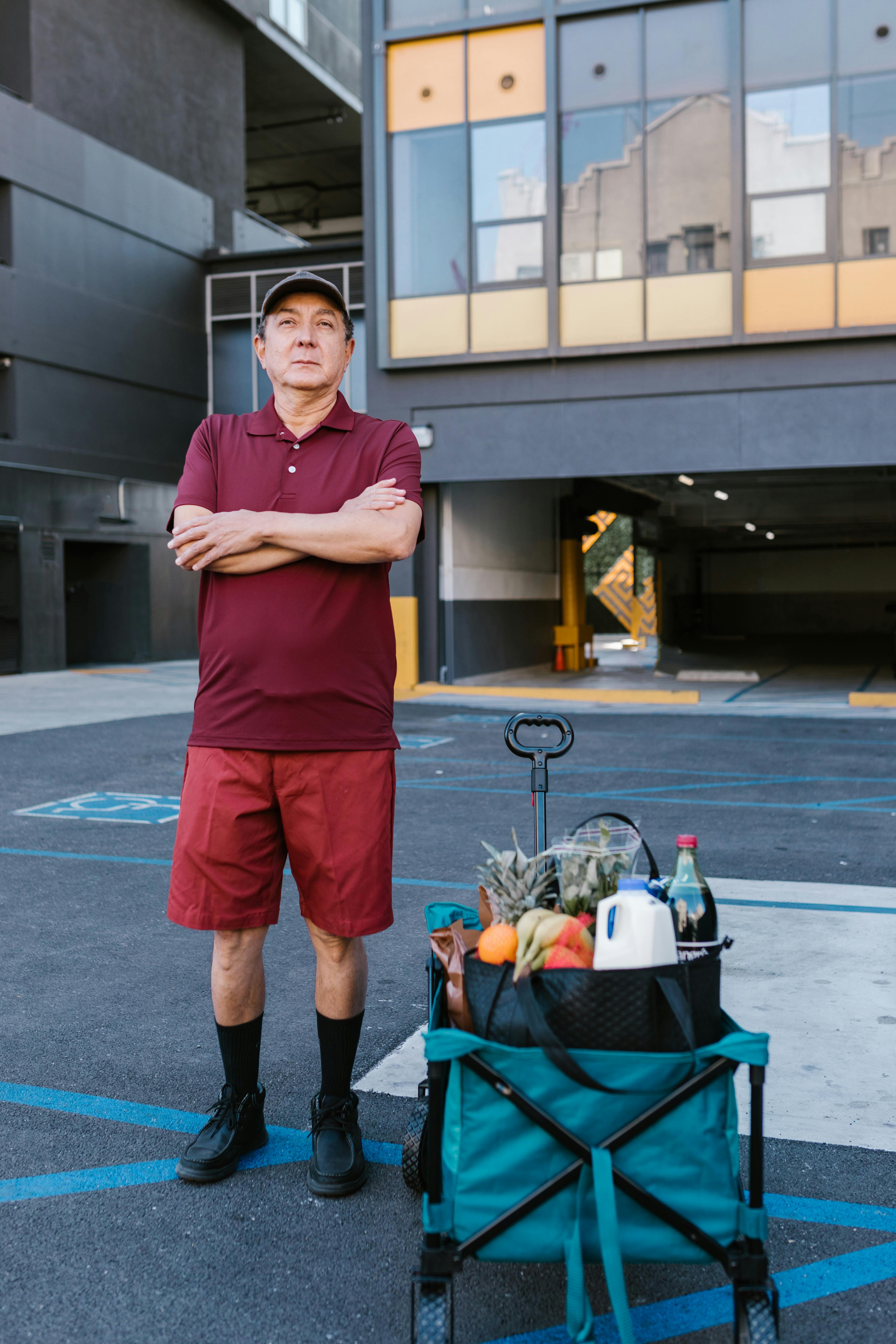 a deliveryman in a parking lot