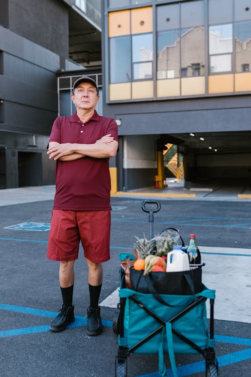 Free A Deliveryman in a Parking Lot Stock Photo