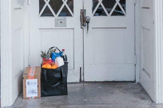 Delivery parcel placed safely at a residential doorway