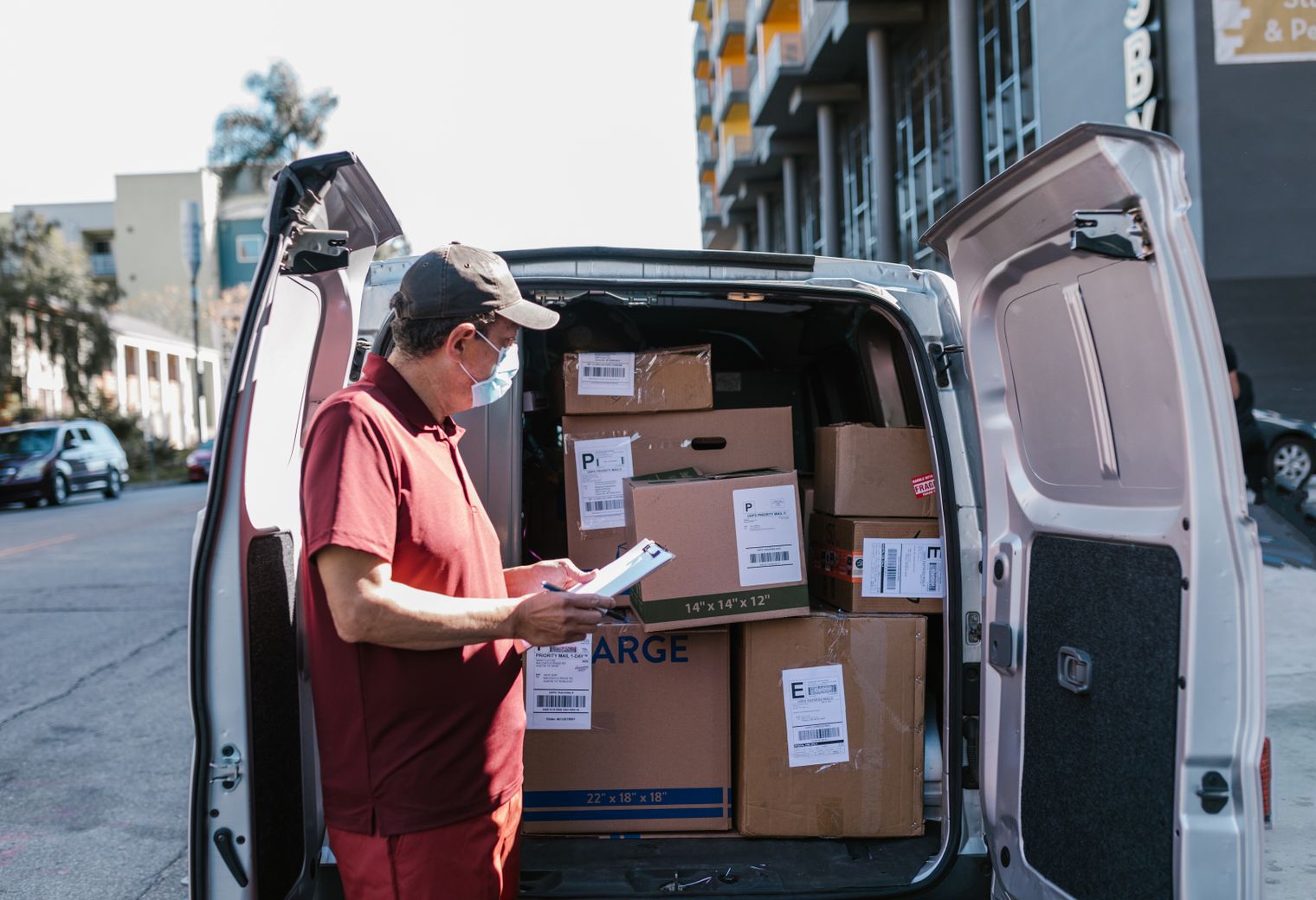 Holloway — house clearance team loading furniture into a van