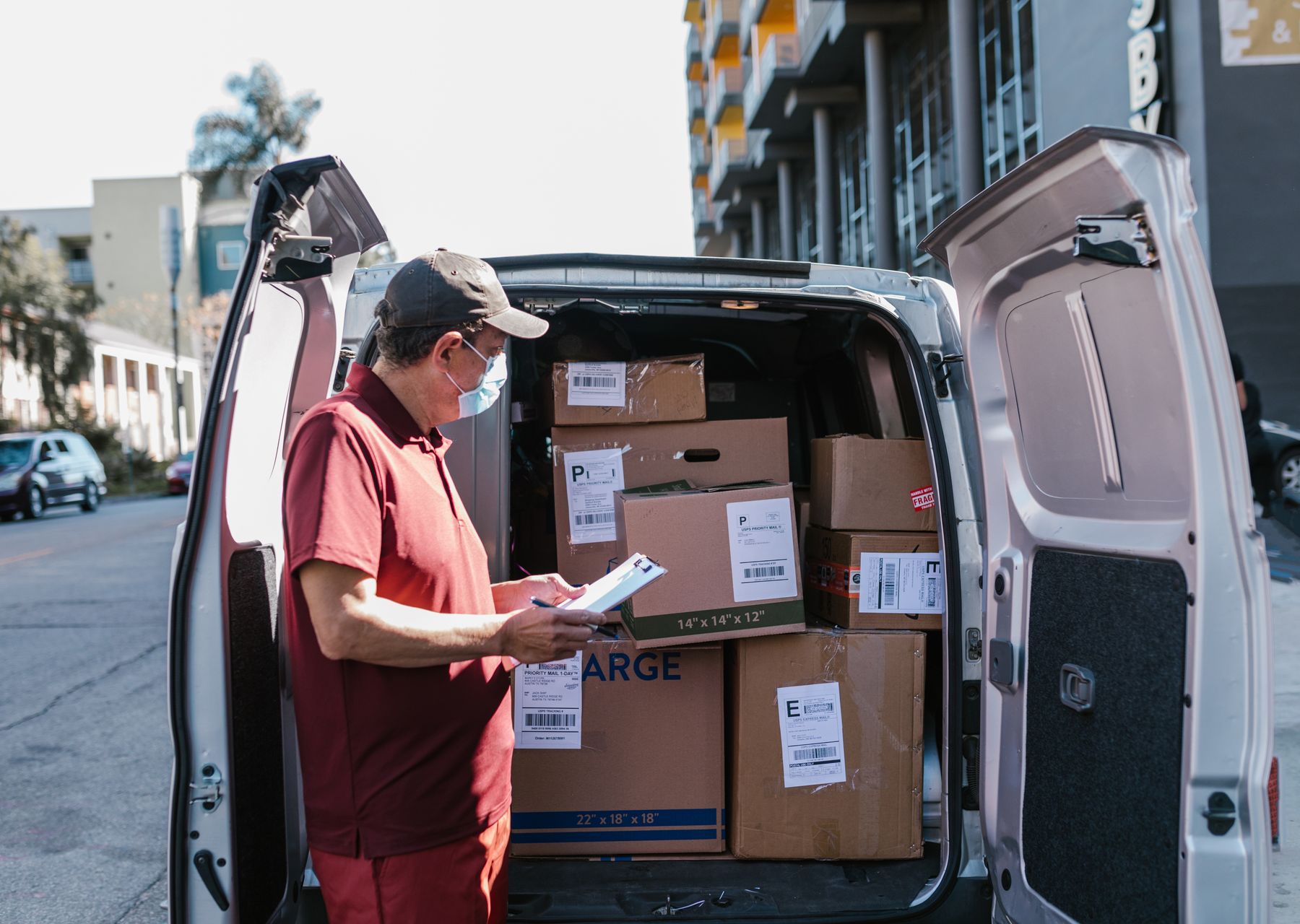 House removals in Hull — crew wrapping and loading on moving day