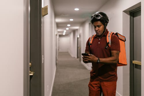 A Deliveryman in a Hallway