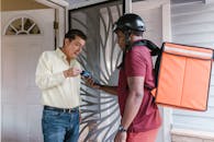 Grocery Delivery Courier at Door