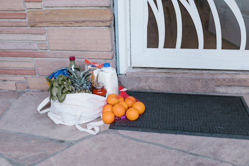 Free A Bag with Groceries on the Floor Stock Photo