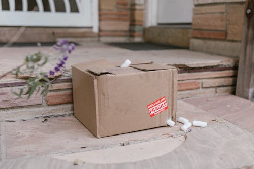 A Cardboard Box with a Hole