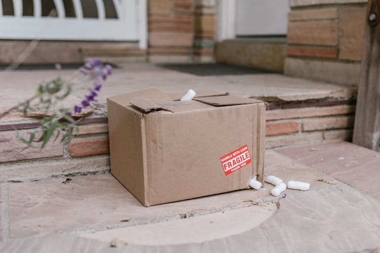 A Cardboard Box With A Hole