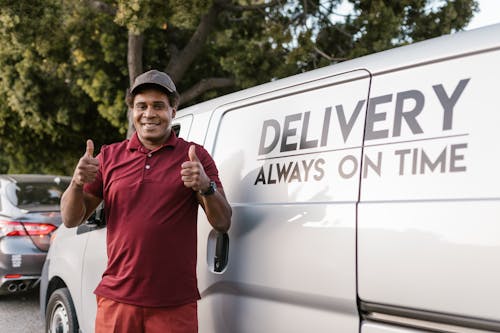Free A Deliveryman with His Thumbs Up Stock Photo