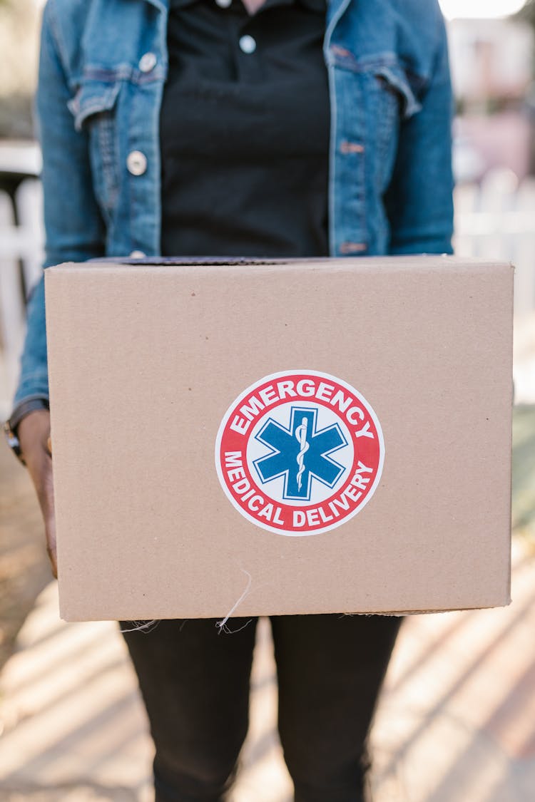 A Person Holding A Box